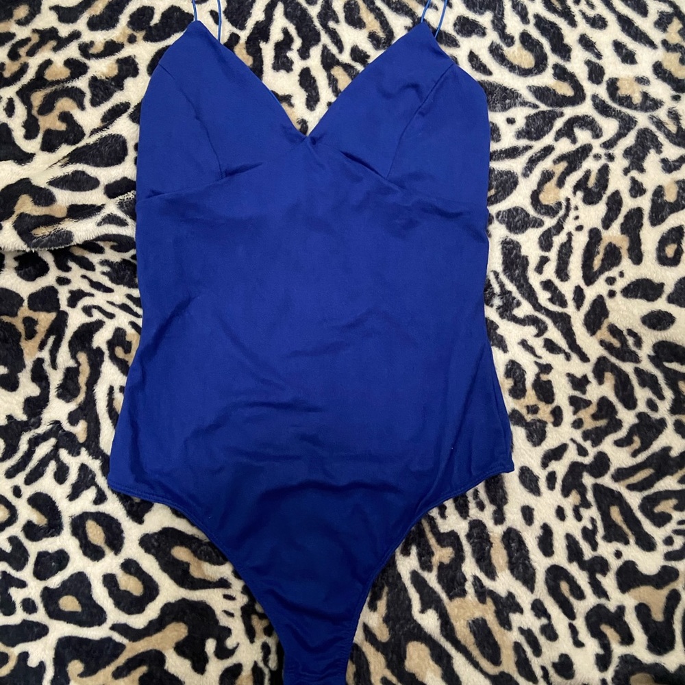 Blue body suit